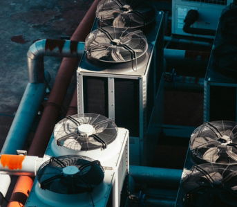 a group of air conditioners sitting next to each other